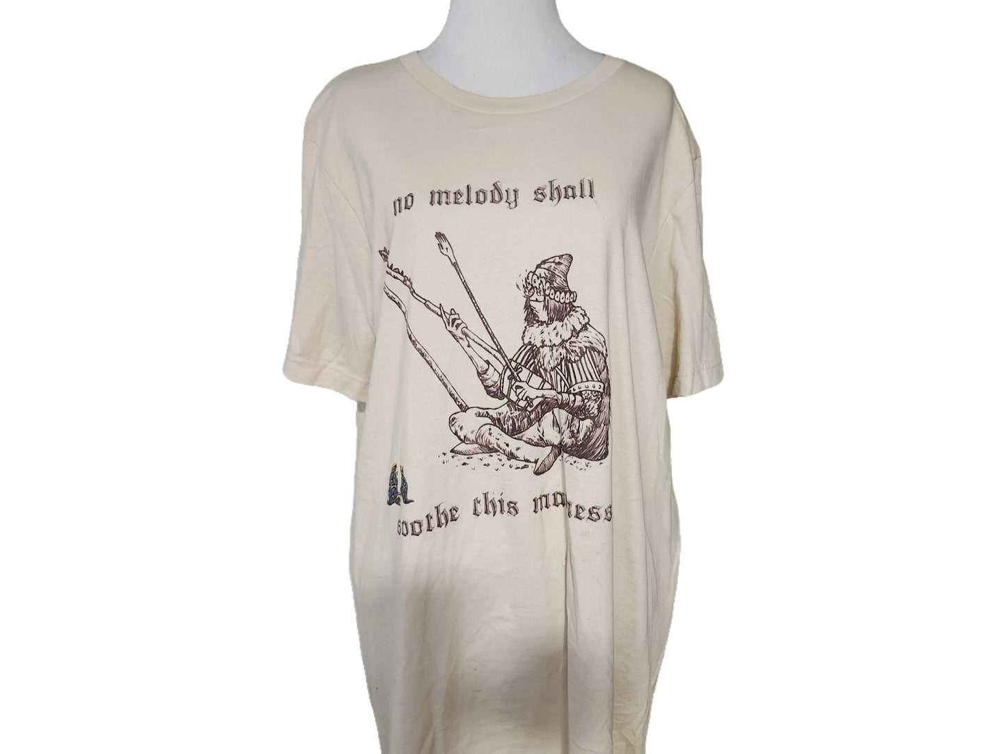 Beige t-shirt with graphic design and text on a white background