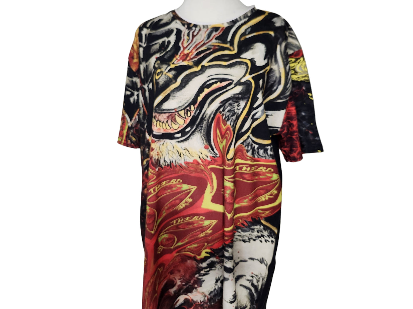 Colorful graphic t-shirt with animal designs on a white background