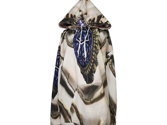 Hooded garment with intricate design and blue accents on a white background